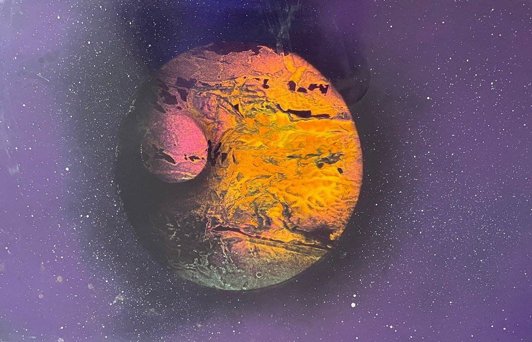 Two Planets Orbiting Purple Space